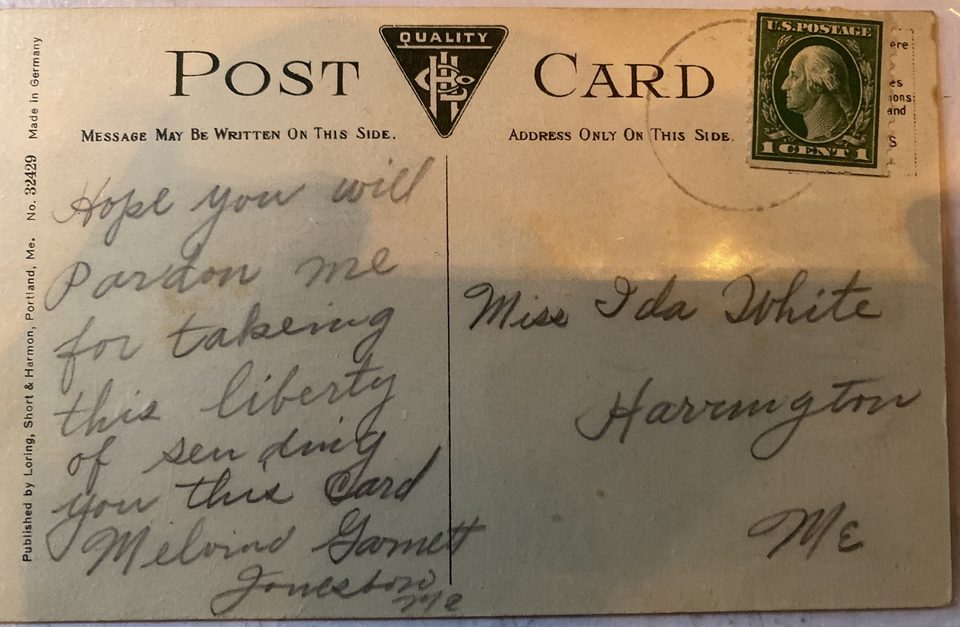 The written side of a postcard with a green one-cent stamp, addressed in pencil to Miss Ida White, Harrington, Me., with a short message signed from Jonesboro.